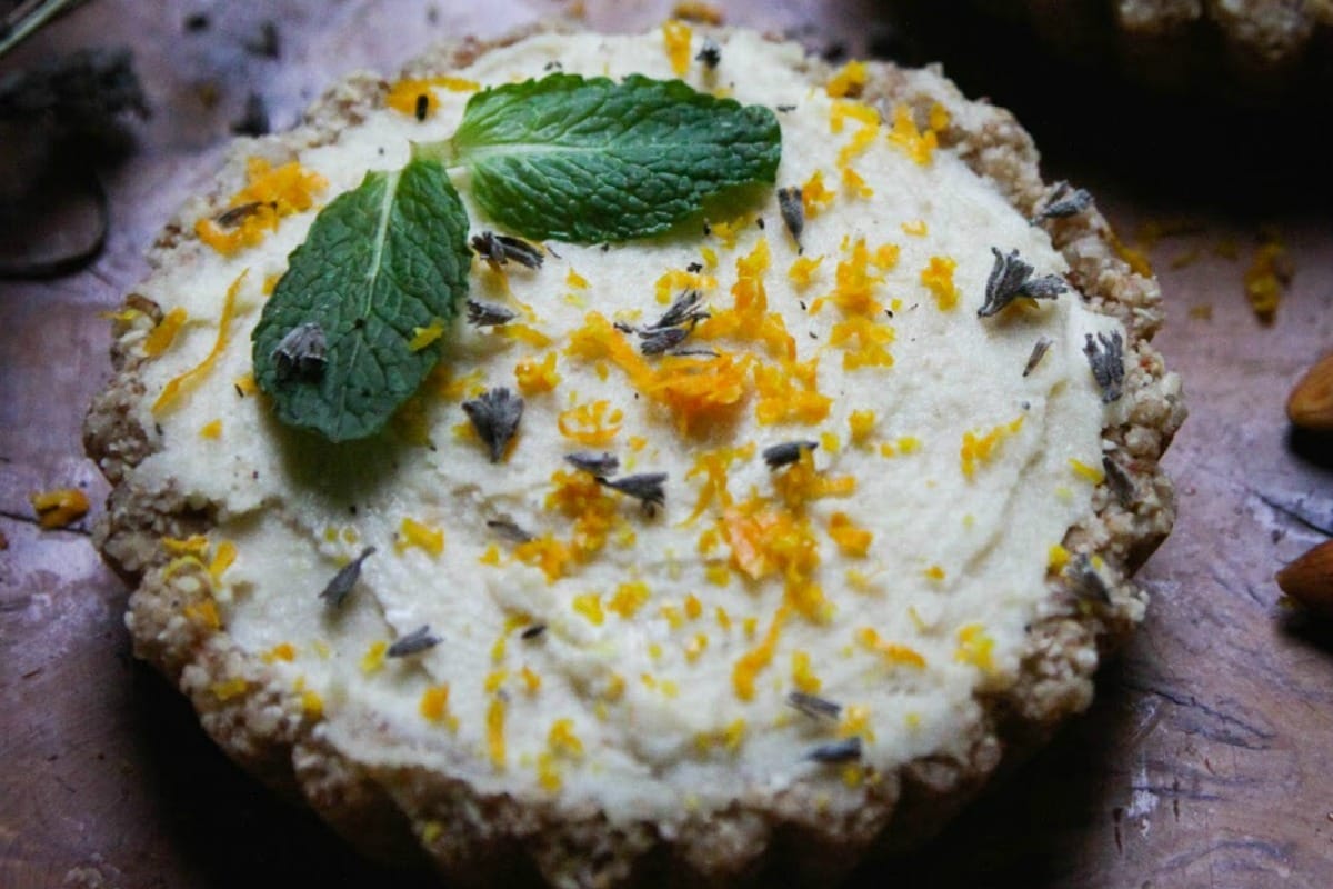 To make the crust: put the oats and almonds into a high speed blender and blend until it turns into a thick, slightly crumbly paste. If needed or desired, add a little maple syrup, then press into two tartlet molds or whatever shapes/molds you like. Put in the fridge. To make the lemon coconut cream: put the coconut and cashews into your high speed blender and blend until it turns into a thick paste/butter. Stir in a 1/4 cup lemon juice and the maple syrup until evenly combined (or blend it in). If you'd like more lemon flavour, add more lemon juice! I like mine quite tart - no pun intended, seriously - so I used a full 1/2 cup. Spread this mixture evenly into your crusts, then let them sit in the fridge overnight or for at least a couple hours so the flavours can get to know each other. Garnish with mint, basil, lemon zest, maple syrup or whatever else you like! Life is good!