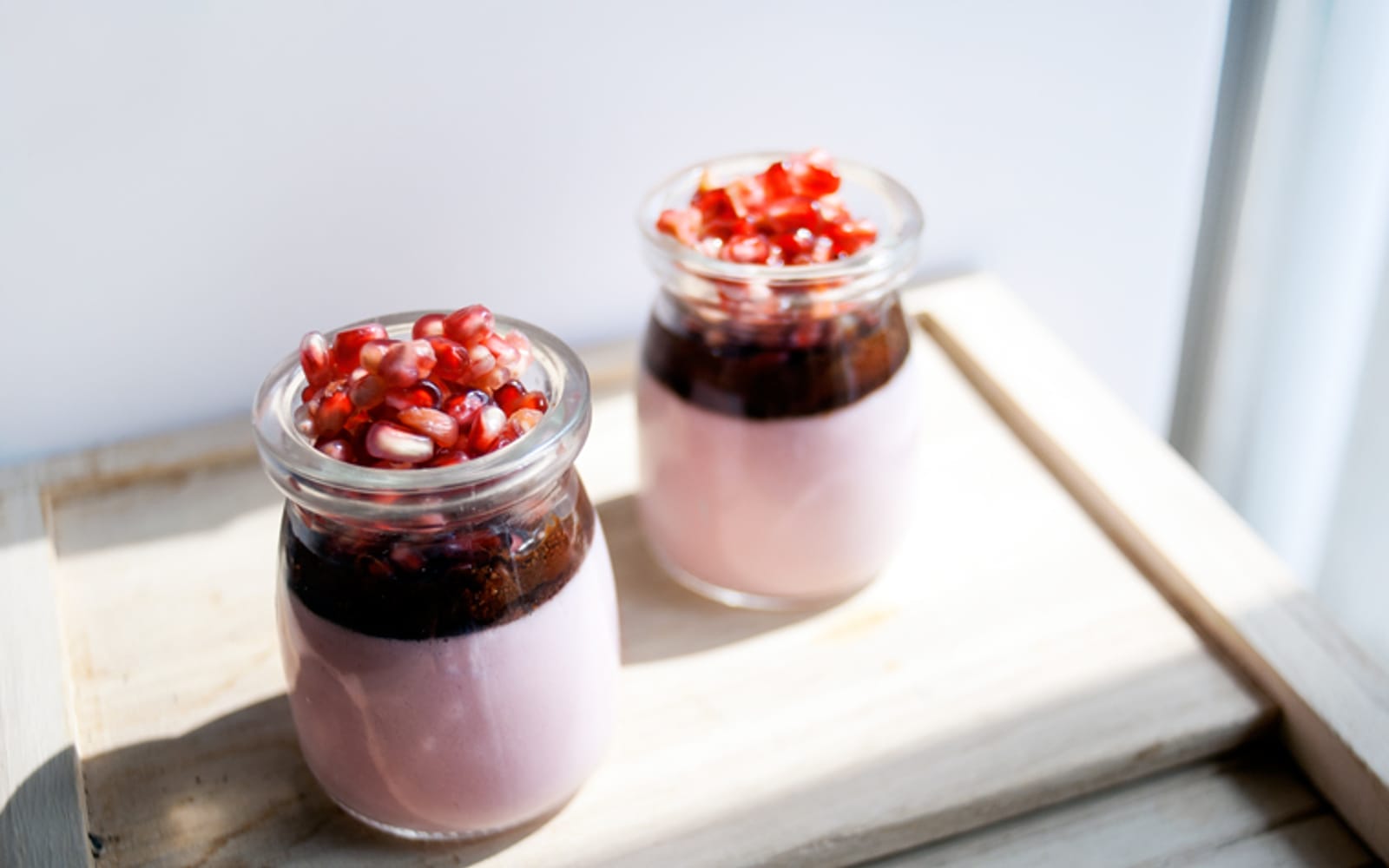 Pomegranate Coconut Panna Cotta With a Chocolate Balsamic Reduction