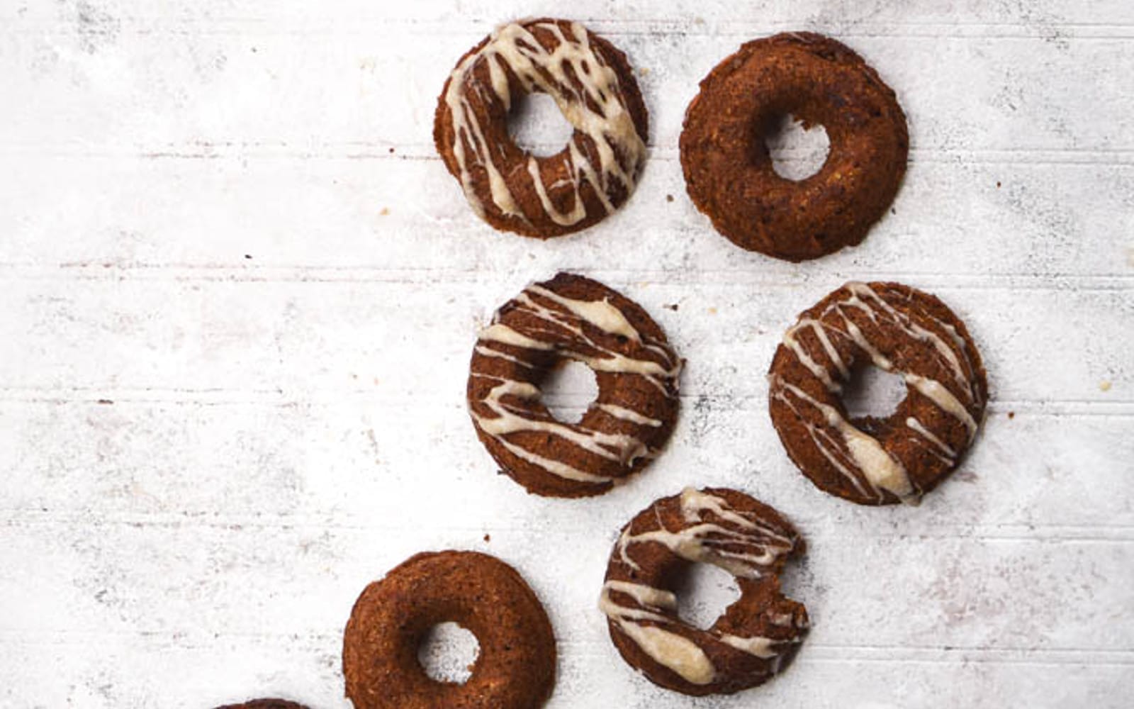 Carrot Cake Baked Doughnuts With Maple Coconut Icing