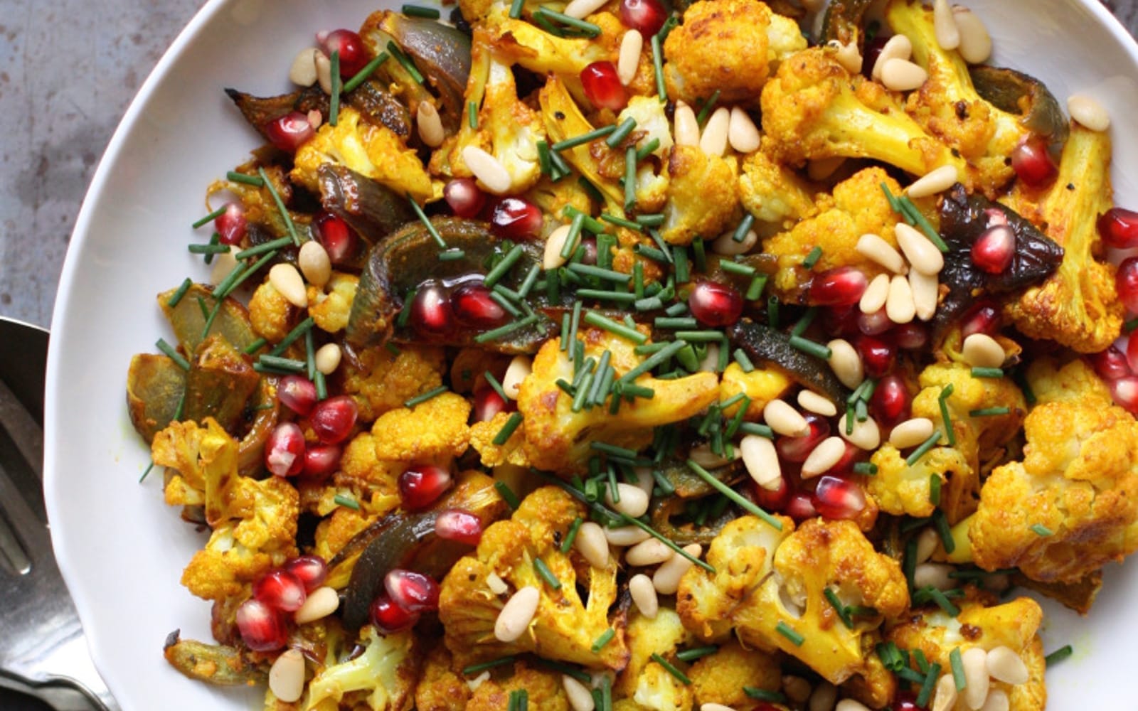 Vegan Grain-Free Turmeric-Roasted Cauliflower With Maple-Pomegranate Vinaigrette