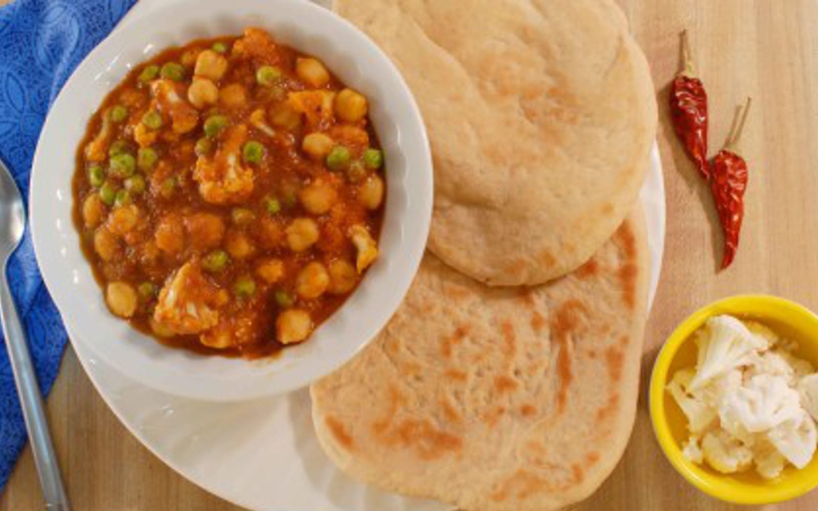 tomoto-coconut-curry-with-chicpeas-and-cauliflower-500x277