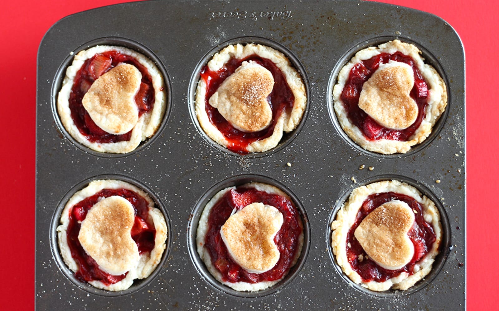Vegan Mini Strawberry Rhubarb Pies Topped With Heart In Muffin Tray