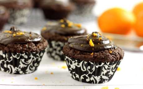 Vegan Orange-Ginger Cupcakes With a Spiced Date Frosting topped with zest 