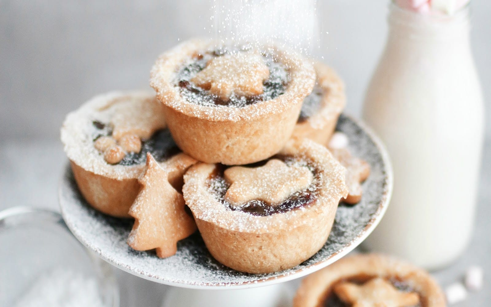 Vegan Gluten-Free Easy Mince Pies topped with sugar and crust cut out holiday shapes