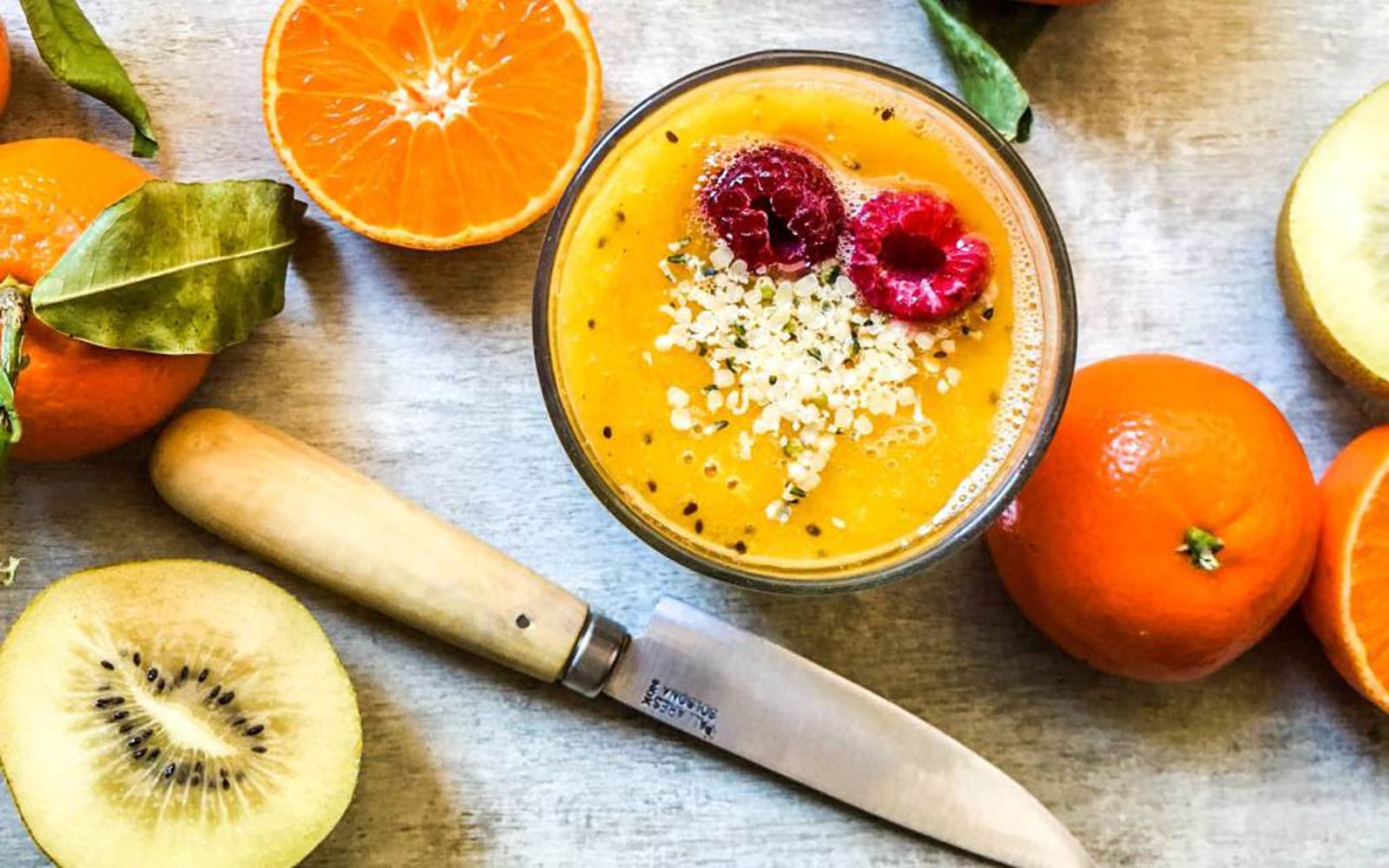 Vegan Gluten-Free Winter Citrus Smoothie with hemp seeds and raspberries