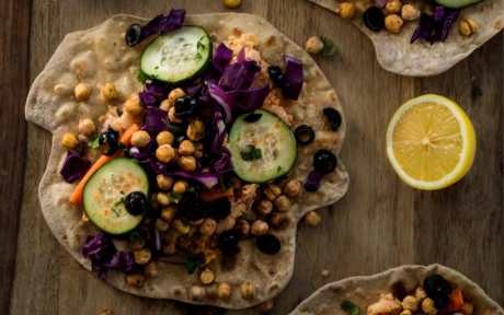 Vegan High-Protein Homemade Flatbread Wraps with White Bean Hummus and Chickpeas with lemon, cucumber, and toppings