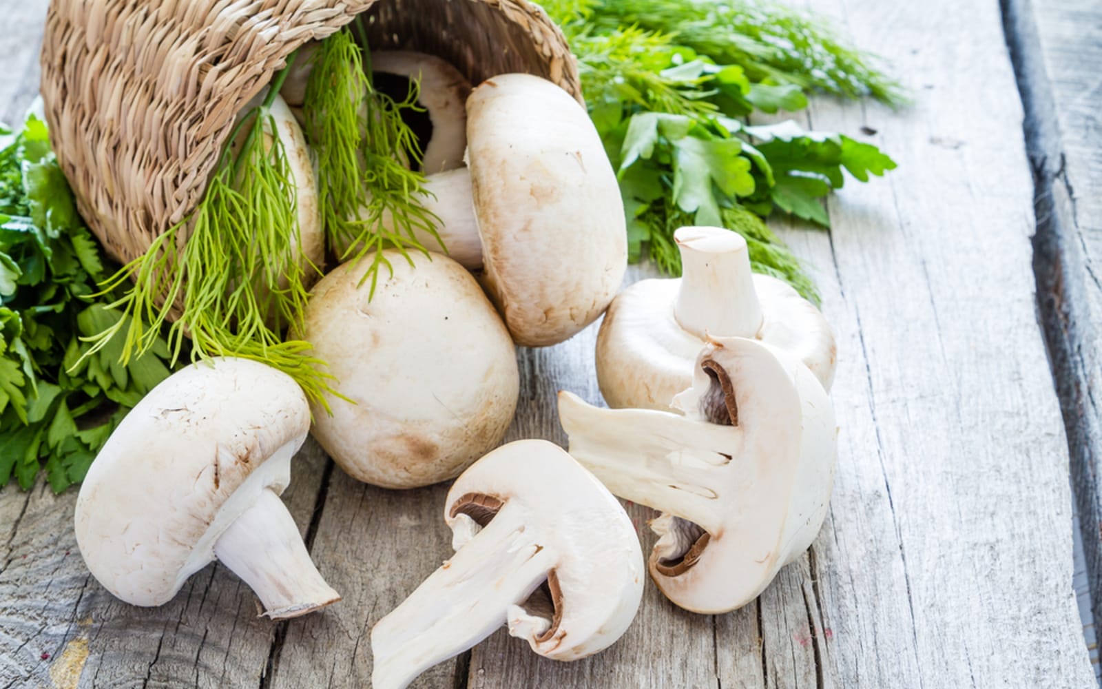 White button mushrooms fresh with herbs