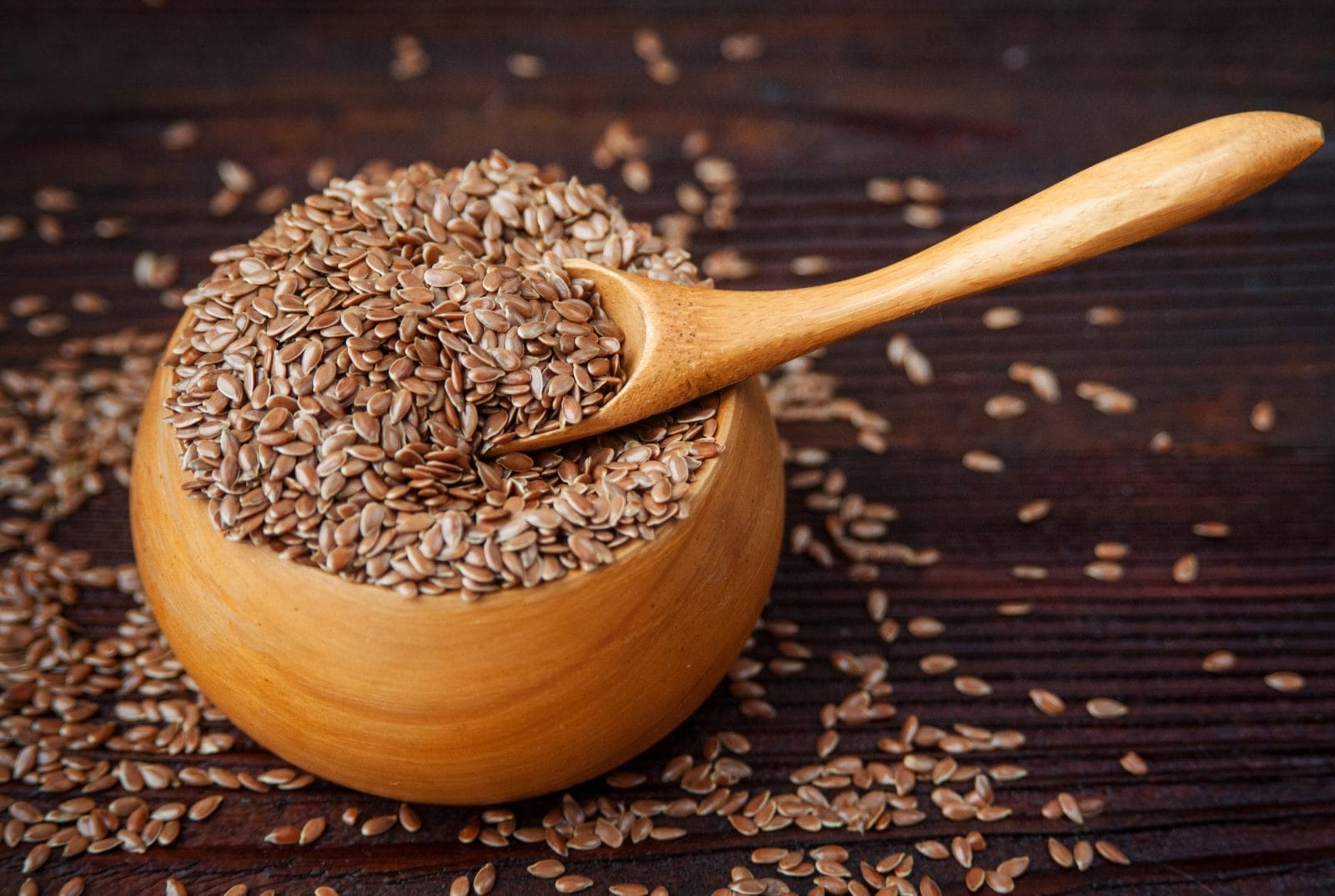 flax seeds in a wooden bowl