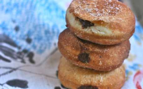 Stack of chocolate stout filled doughnuts