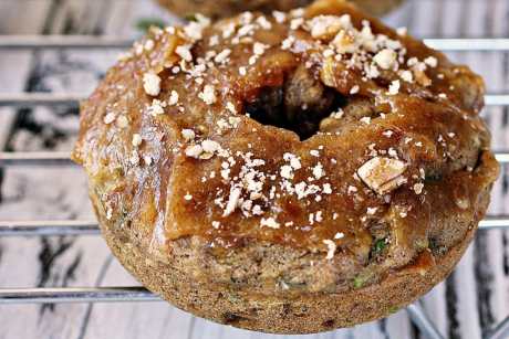 Maple zucchini doughnuts on cooling rack