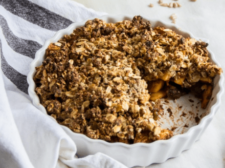 Vegan crumble with cinnamon apple and sunflower seeds