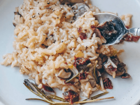 creamy vegan mushroom risotto with dried cranberries