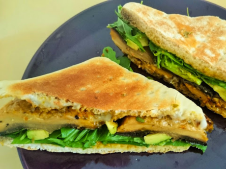 Sandwich with mushroom patty and spinach