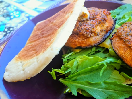 Sandwich with mushroom patty and spinach