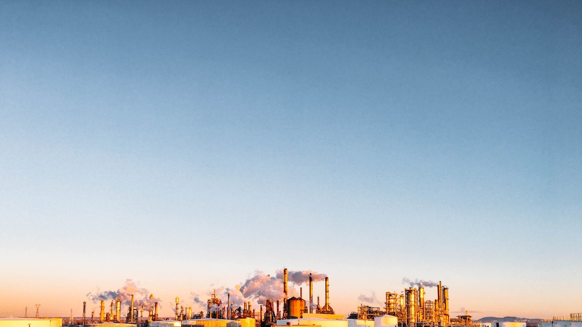 Oil Refinery Over Landscape