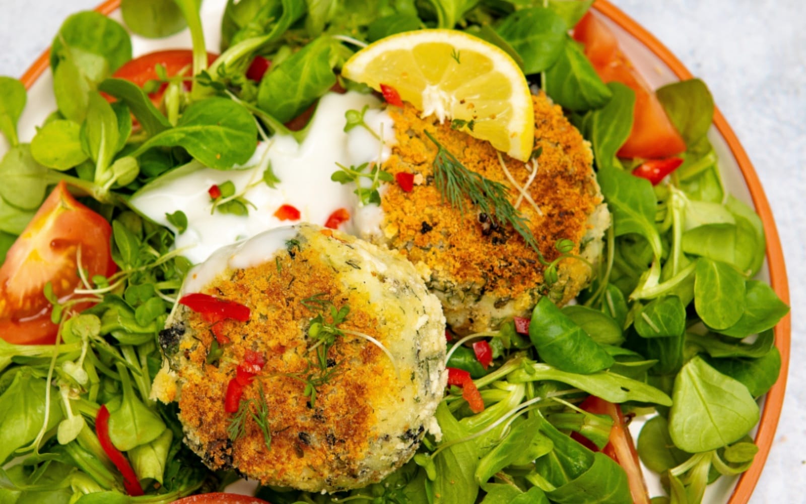 vegan fishcake over salad