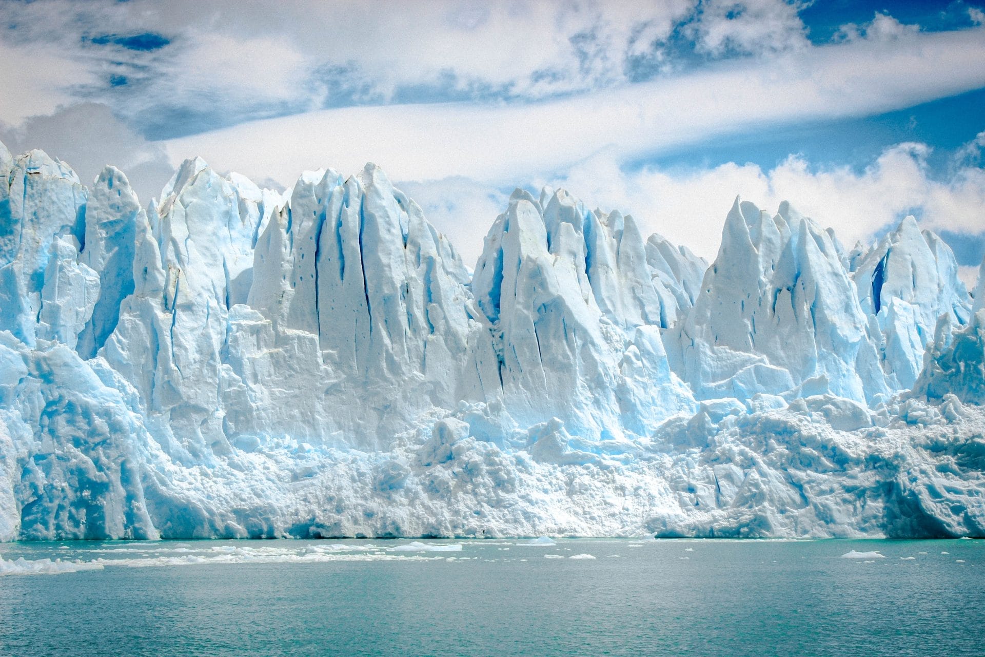 Icebergs Falling Into Water