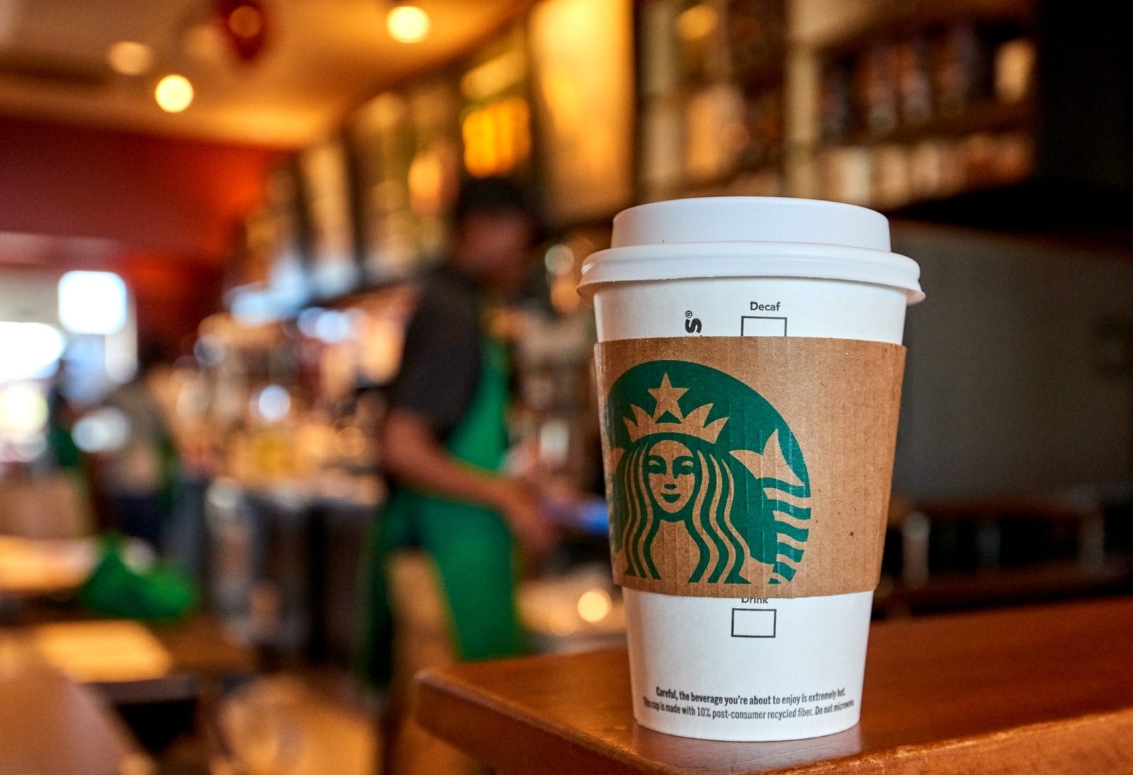 Paper starbucks cup in a starbucks store