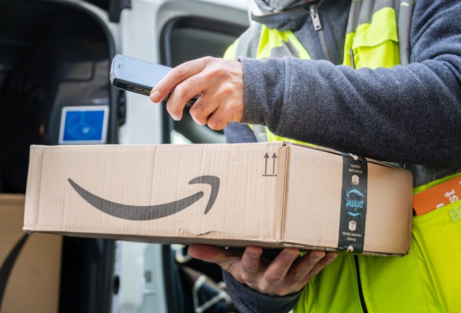 Amazon worker delivering package