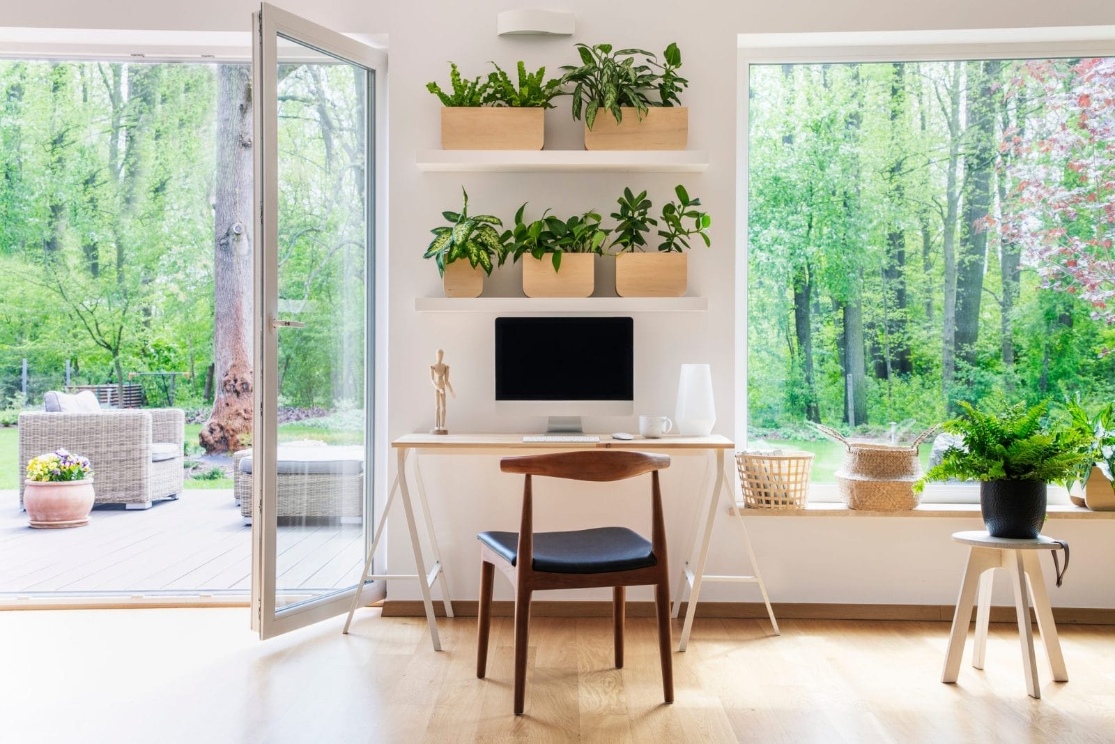 Zen home office with computer and natural light