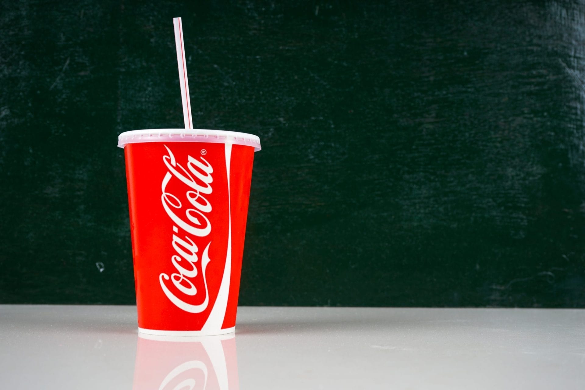Coca-Cola cup with straw