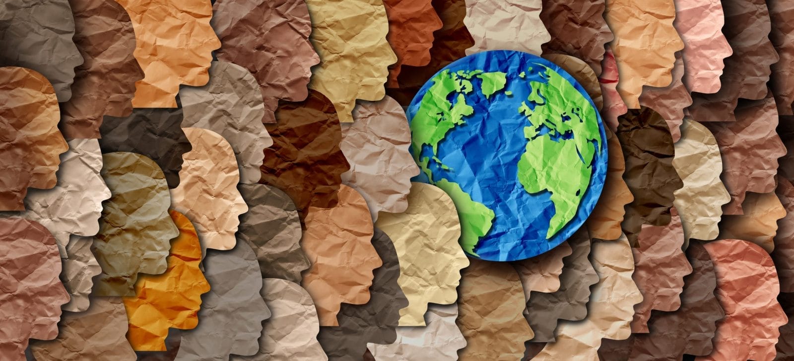 silhouettes of faces of different skin colours surrounding a globe in a crumpled paper style