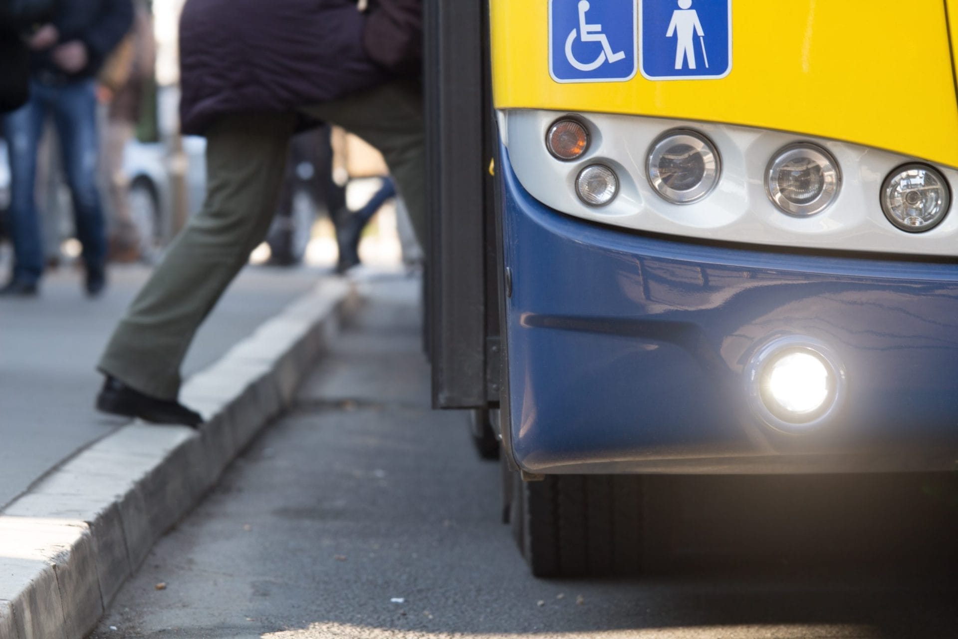 Someone getting on a bus