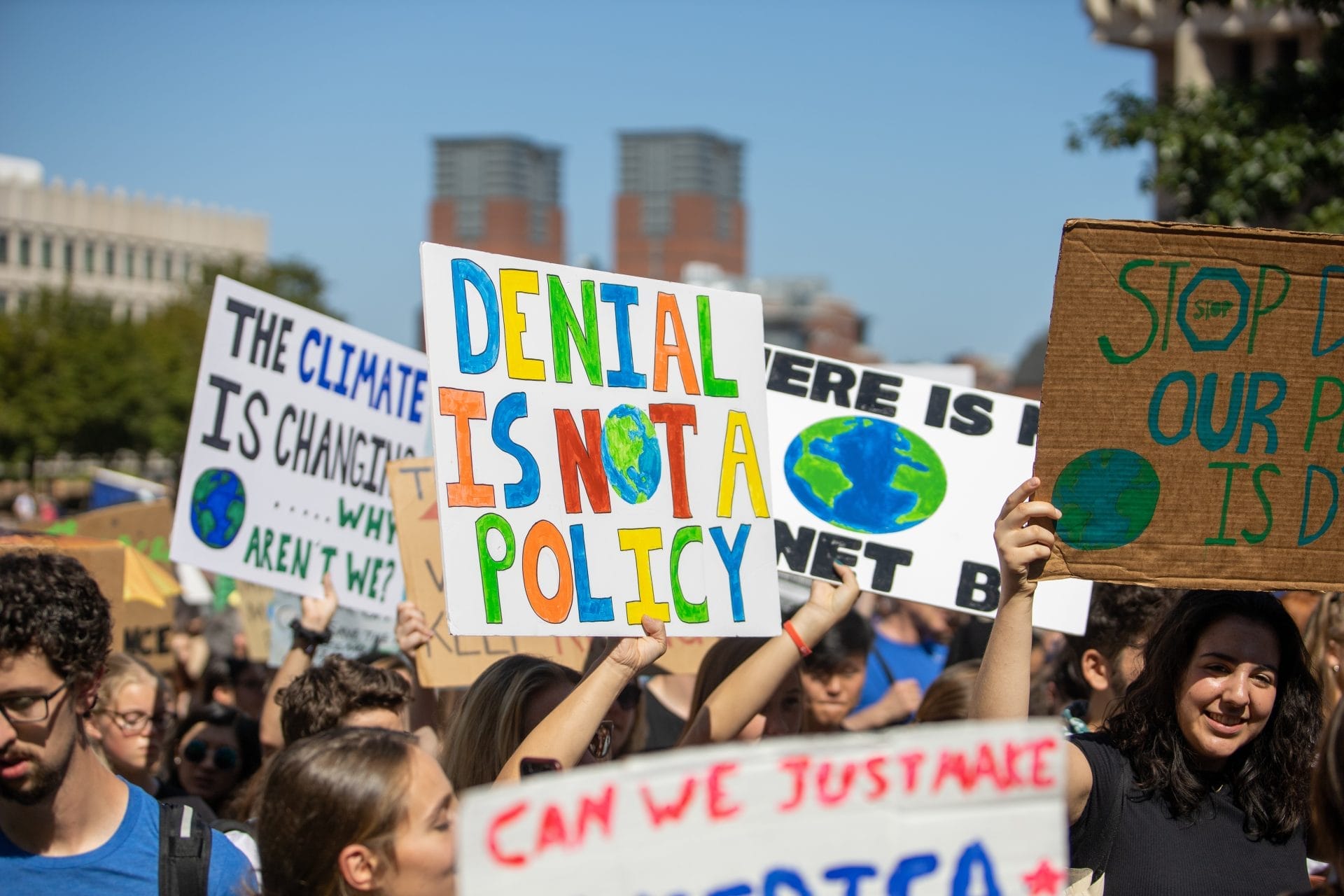 People holding signs at climate strike
