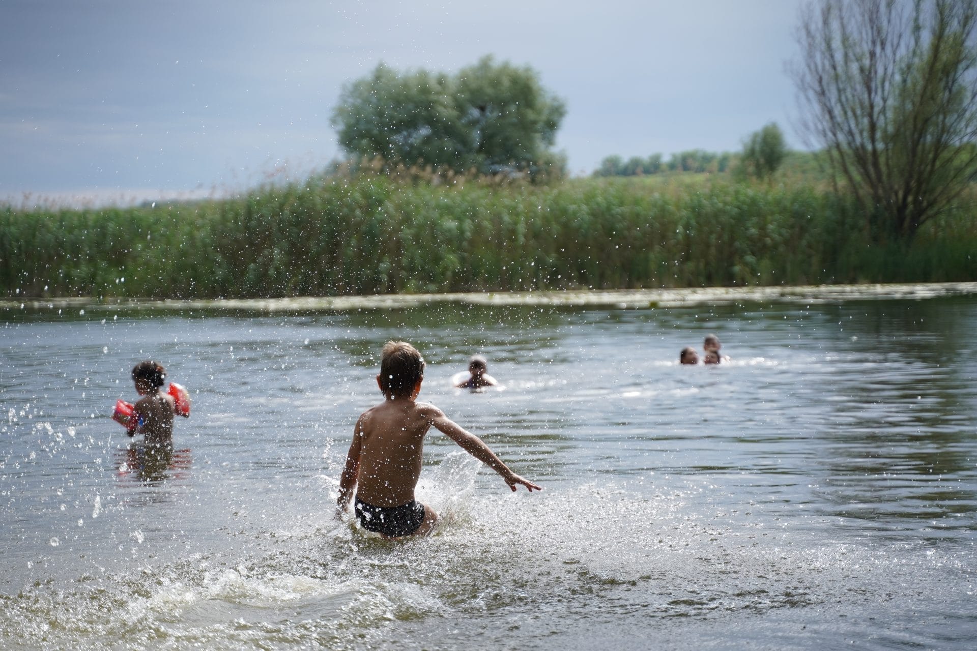 Children splashing around in water