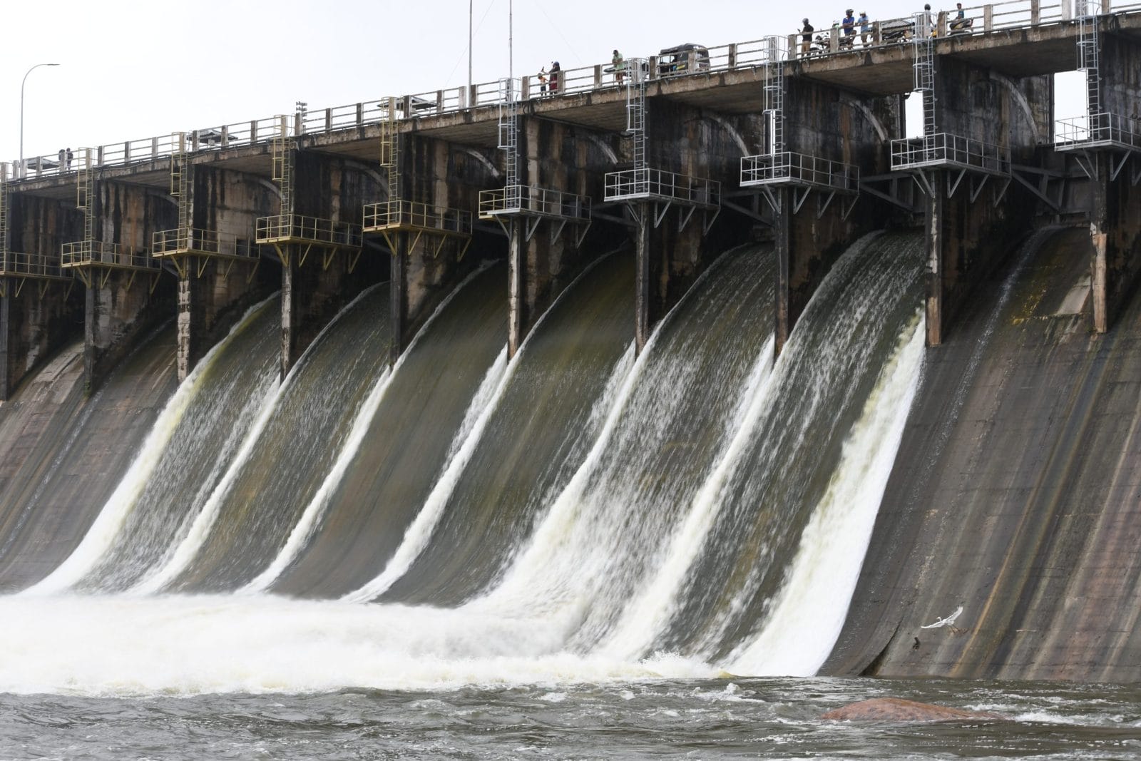 Hydroelectric dam on the river with water overflowing the dam after heavy rain. water discharge from the reservoir. Floods, Quality images, Reservoir overflow, River overflow Beautiful pictures.