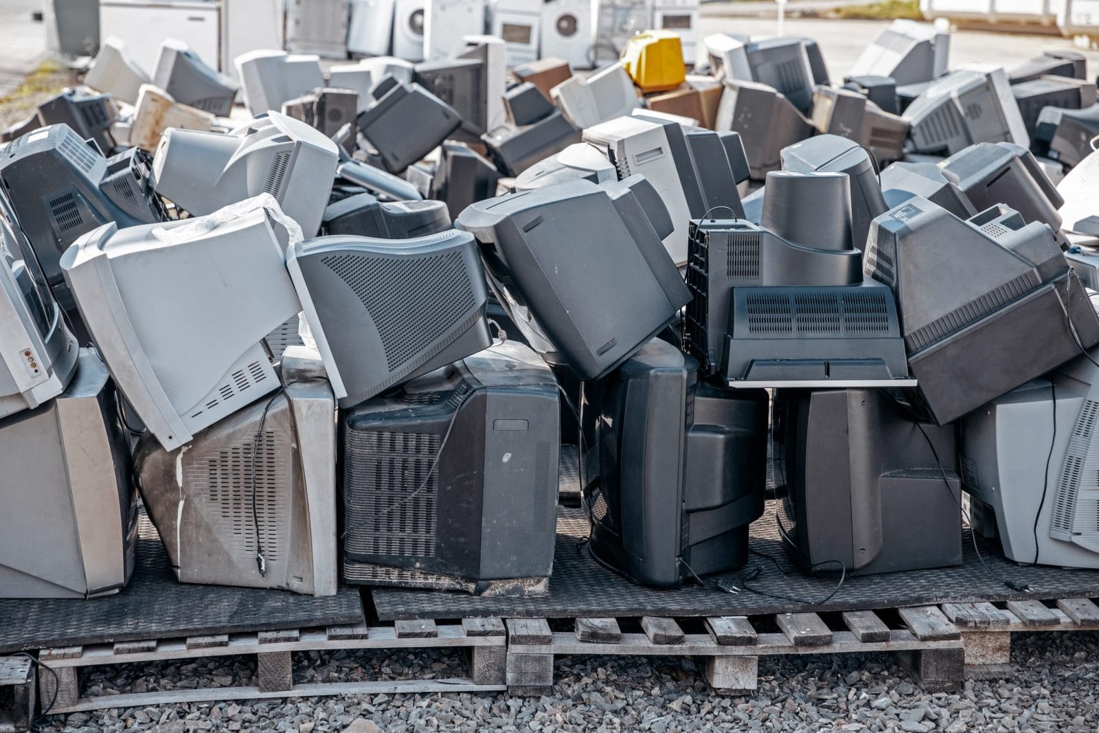 Heap of electronical appliances waste, monitors and tv-s