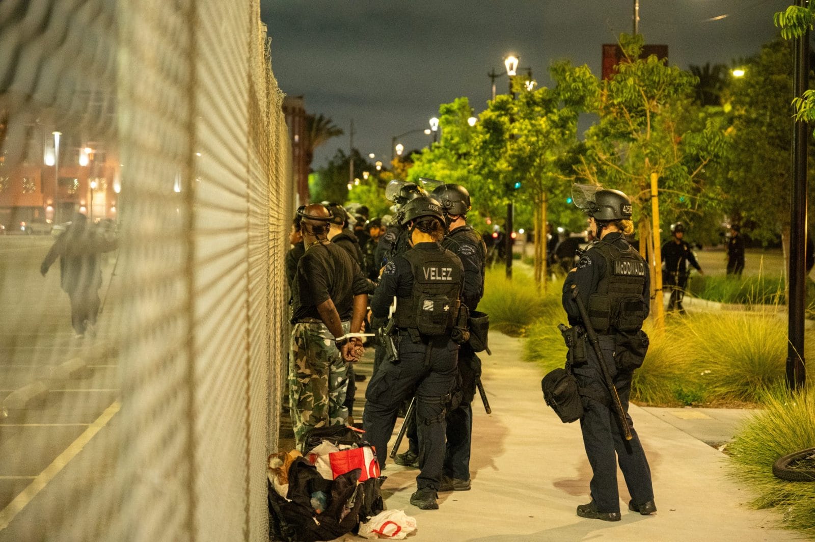 Los Angeles, CA-APR 8 2025: LAPD arrest protesters following a night of unrest due to illegal arrests of undocumented migrants by ICE officers