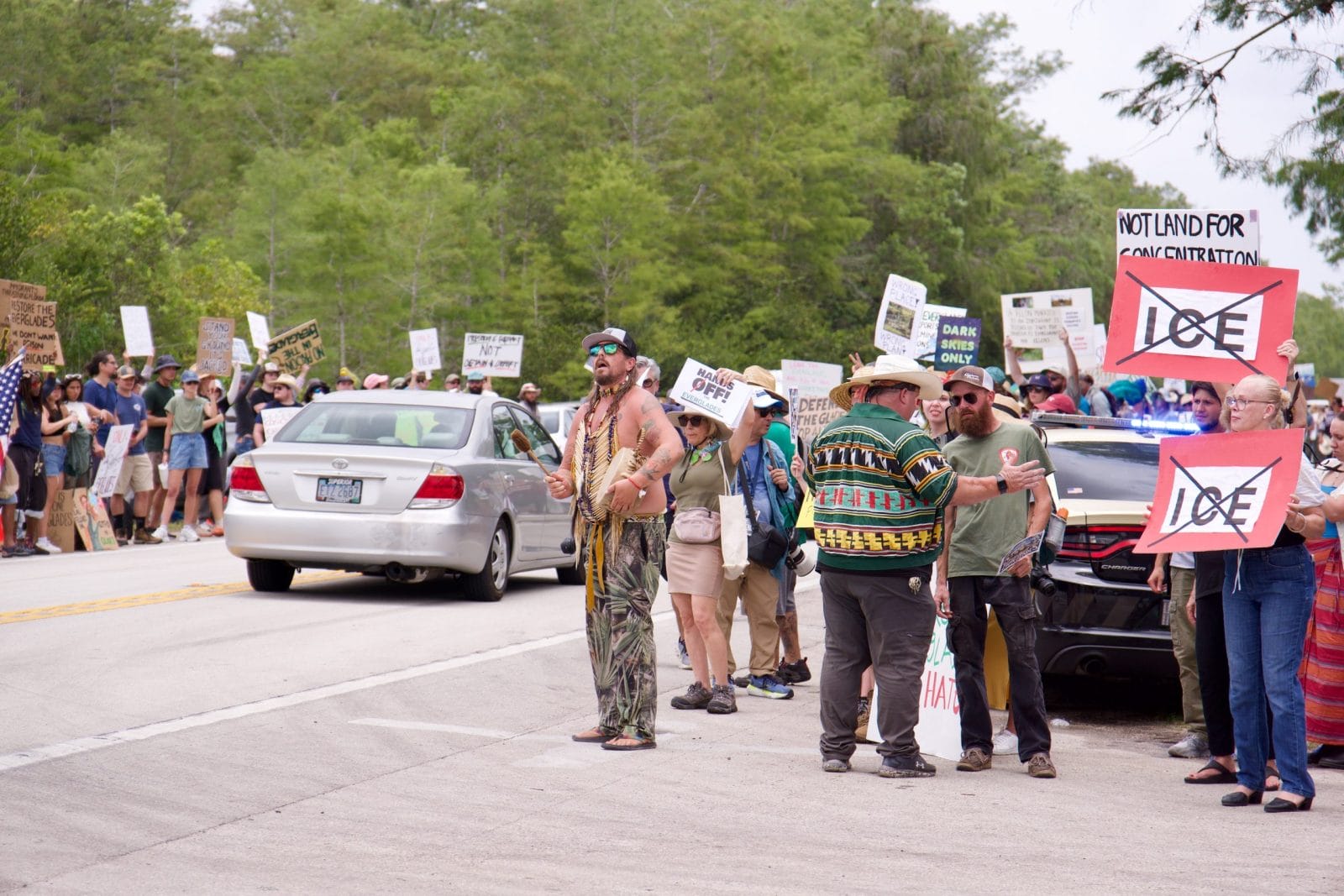 Florida Everglades June 28, 2025 Protesters line the highway in the Florida Everglades to oppose the construction of "Alligator Alcatraz", a new immigrant detention center.