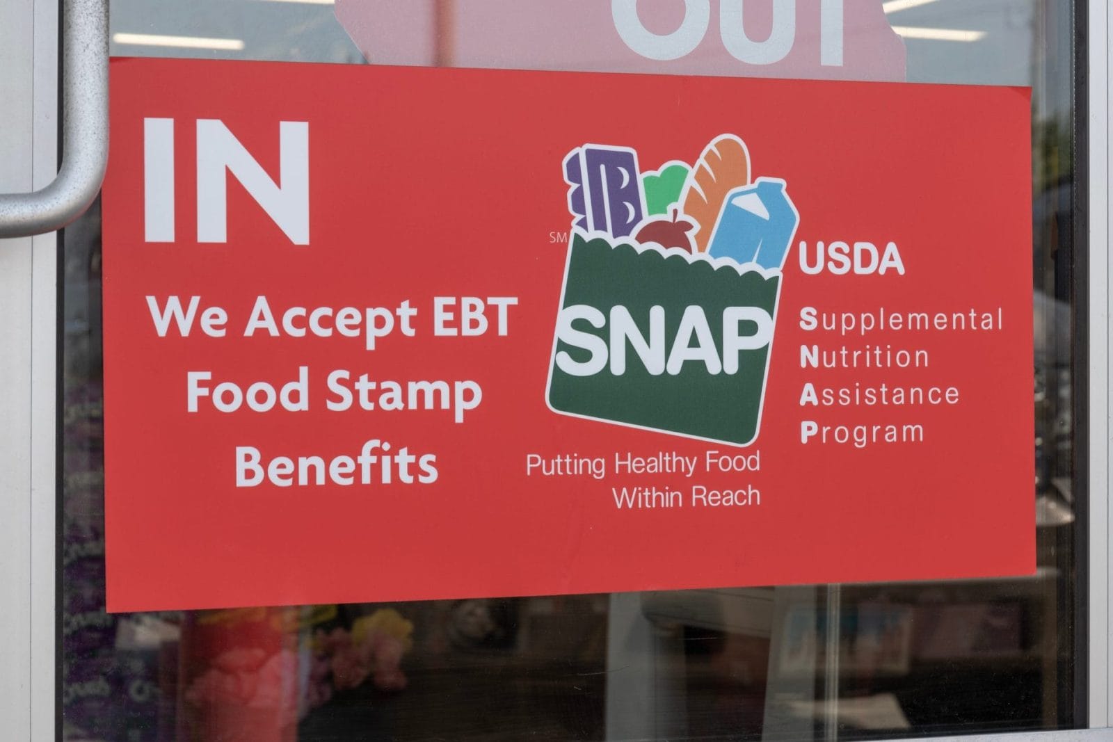 Danville - June 2, 2023: SNAP and EBT Accepted here sign. SNAP and Food Stamps provide nutrition benefits to supplement disadvantaged families.